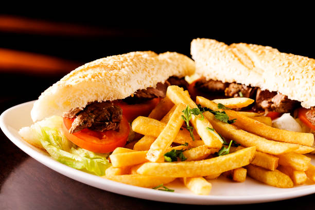 istock Handmade hamburger on wooden background with spices 1146520890