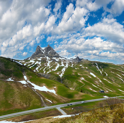 Summer mountain landscape with snow on slope, Warth, Austria