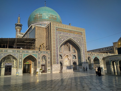 Mashhad, Iran - 10 22 2017: Haram complex and the Imam Reza Shrine, the largest mosque in the world by dimension in the holiest city in Iran - Mashhad