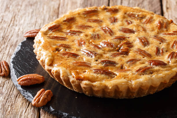 istock Freshly prepared pecan tart with cinnamon and vanilla close-up on the table. horizontal 1146526507