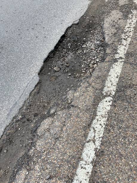 istock City Street with Pothole 1146526809