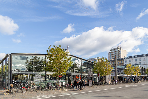 Copenhagen, Denmark - November 3, 2016: Exterior view of Torvehallerne, a popular modern market place.