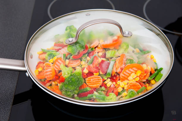 Frozen vegetables in the frying pan