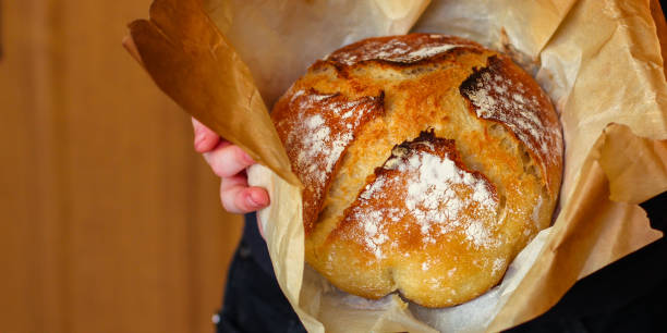 istock white bread round form, fresh pastries. food background. top 1146530083