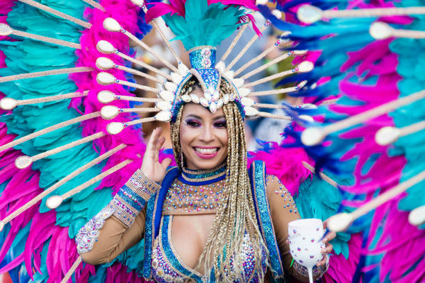 Carnival of Aruba A colorful girl, walking in the parade of the huge carnival of Aruba in Oranjestad. This year the caribbean island celebrated the 65. carnival. showtime stock pictures, royalty-free photos & images