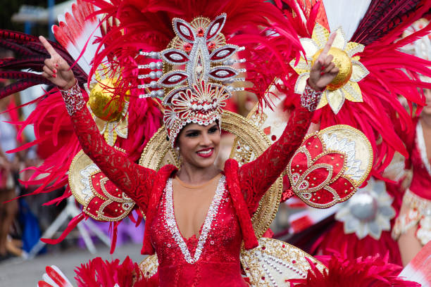 Carnival of Aruba A colorful girl, walking in the parade of the huge carnival of Aruba in Oranjestad. This year the caribbean island celebrated the 65. carnival. showtime stock pictures, royalty-free photos & images