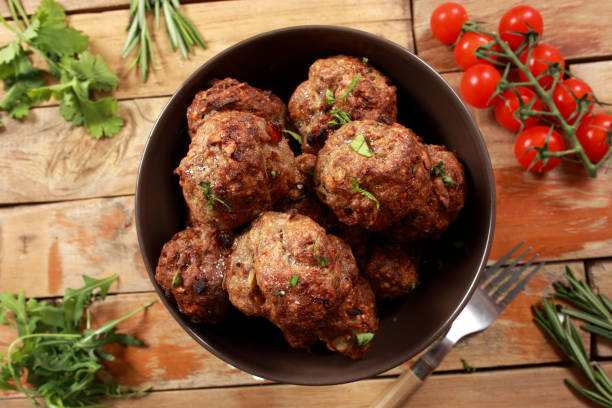 istock Roasted Beef Meatballs garnished with spicy sauce 1146531563