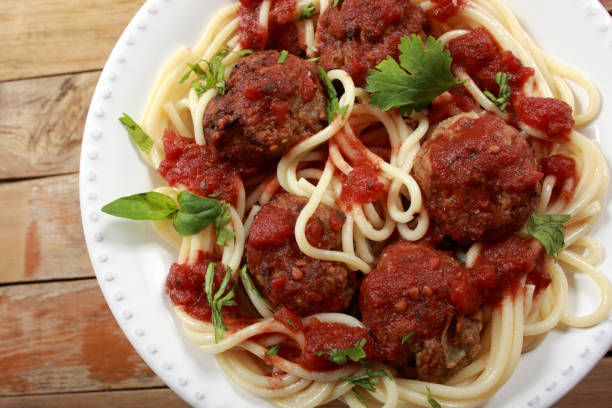 istock Roasted Beef Meatballs garnished with spicy sauce 1146531570