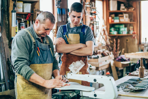 istock Father and son carpenters 1146531575