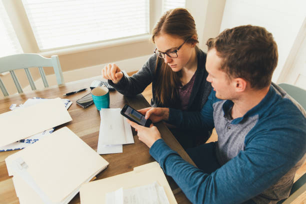 istock Young Married Couple Doing Monthly Budget 1146532503