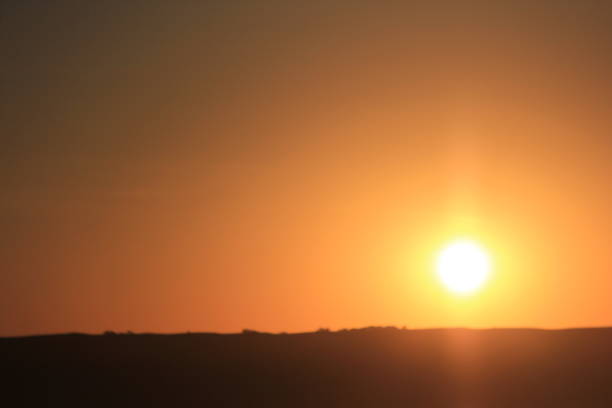 istock Foggy Orange Sky by Andrea Lawrence C 1020377 Saskatchewan 1146533179