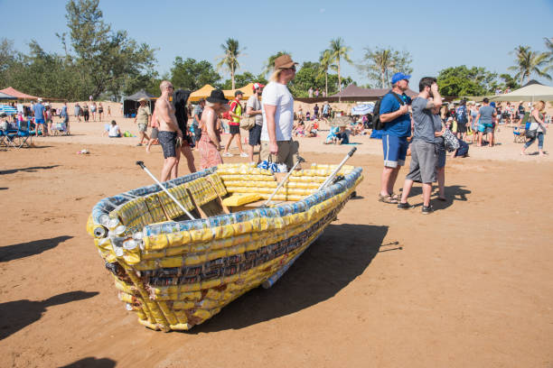 gathering at mindil beach with recycled boat - darwin northern territory australia beach imagens e fotografias de stock