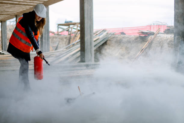 istock Female rescue worker on construction site 1146542348