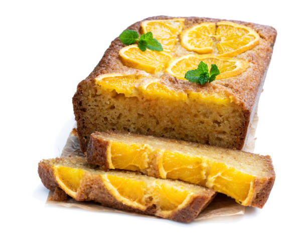 istock Homemade orange syrup cake on white wooden table 1146545158