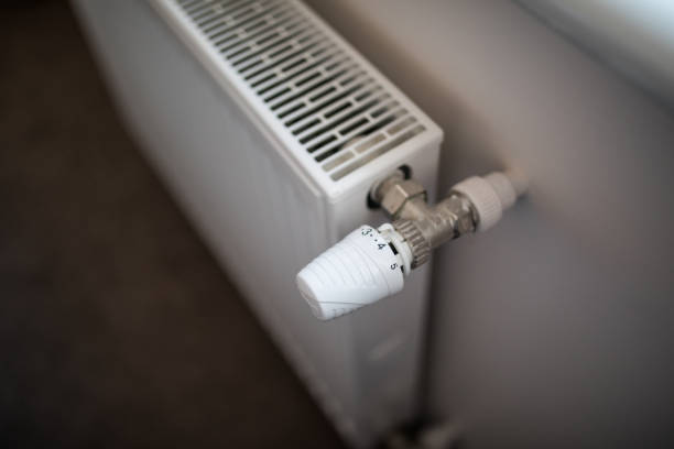 istock temperature knob of heating radiator at home 1146546001