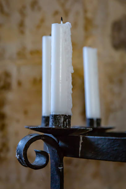 istock Candles in a Candle Holder 1146547136
