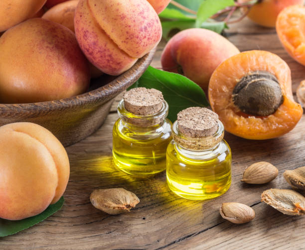 istock Apricot kernel oil and apricot kernels. 1146552029