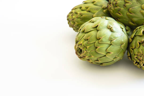Fresh green organic artichokes isolated on white which are famous and popular in Urla Izmir Turkey