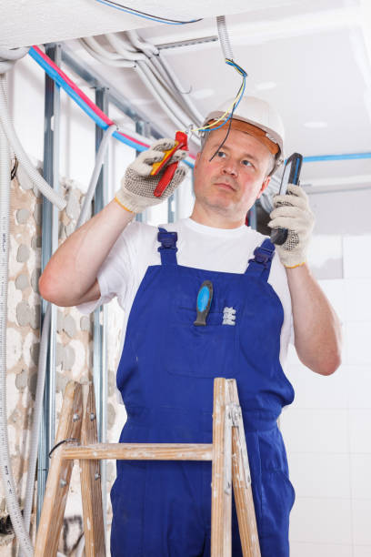 istock Electrician mounting electrical wiring 1146552915