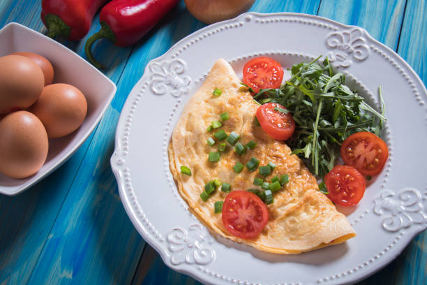 istock Omelette with tomato and salad 1146552965