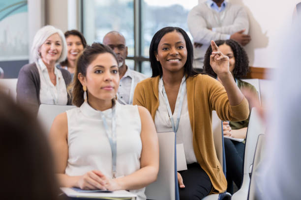 istock African American woman questions presenter 1146553432