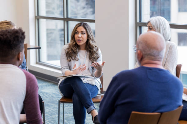 istock Hispanic leader explains purpose for the recovery group 1146553511