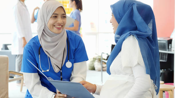 istock Doctor and patient share a lighthearted moment 1146554283