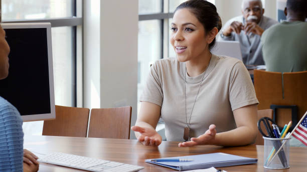 istock Female soldier talks with bank loan officer 1146554621