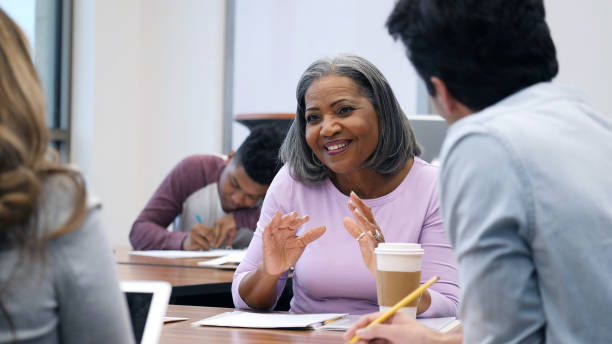 istock Cheerful adult student participates in study group 1146554633