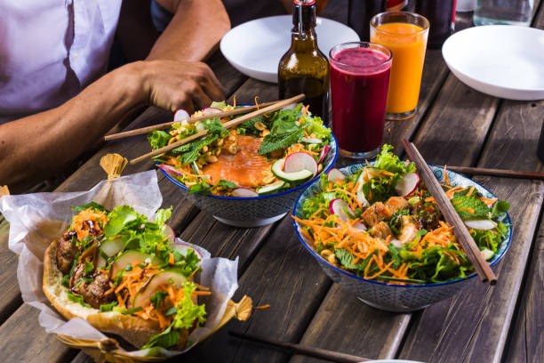 istock Two males eating various dishes with beer 1146562283