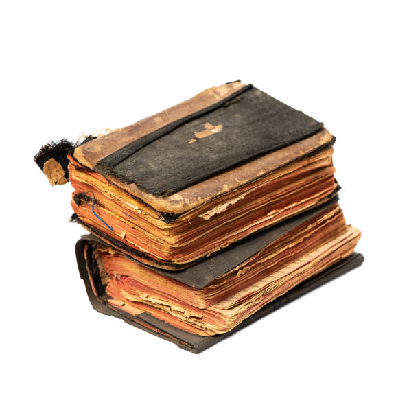istock Two ancient prayer books, angle wise, set. Objects isolated on white background with clipping path 1146563028