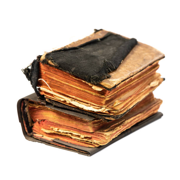 istock Two aged book books isolated on white background with clipping path, an angle 1146563036