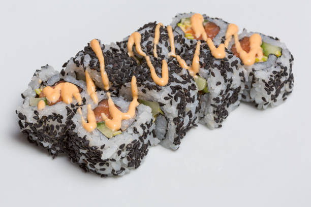 istock Smoked salmon sushi roll with organic black sesame 1146565023