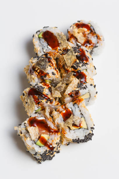 Smoked salmon sushi roll with organic black sesame