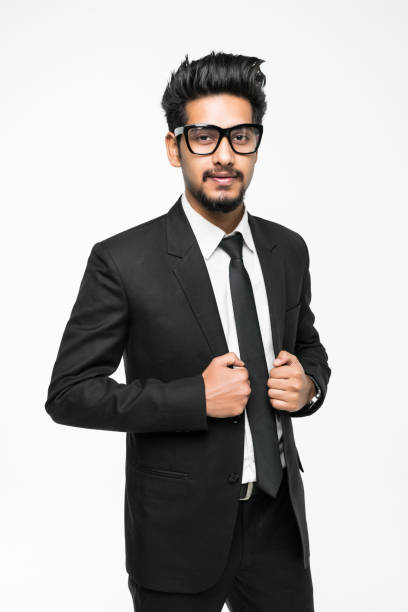 istock Handsome indian man in glasses standing against white background 1146568972