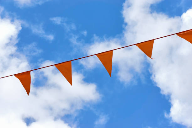 istock Orange triangle pennant banner flags on Koningsdag in the Netherlands 1146569854