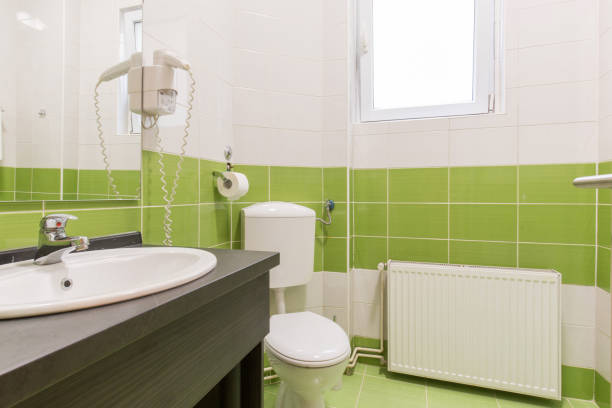 istock Hotel bathroom interior with shower cabin 1146570738