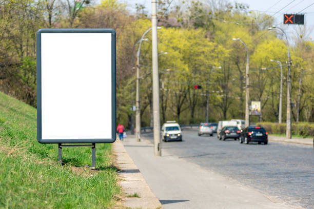 istock Vertical blank white billboard with place for text or mock up. 1146572503