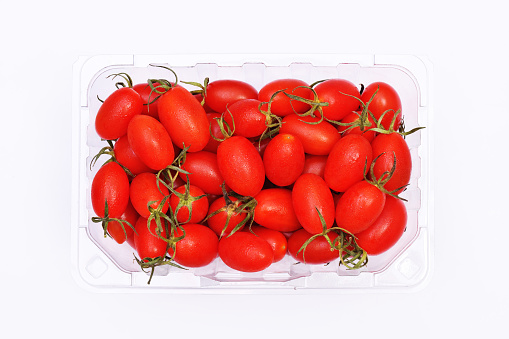 Cherry tomatoes on white wackground