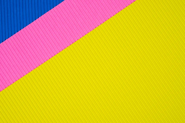 istock Multi coloured corrugated paper texture, use for background. vivid colour with empty space for add text or object. 1146576815