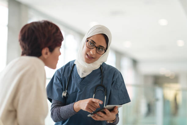 istock Muslim surgeon consults female patient 1146576896
