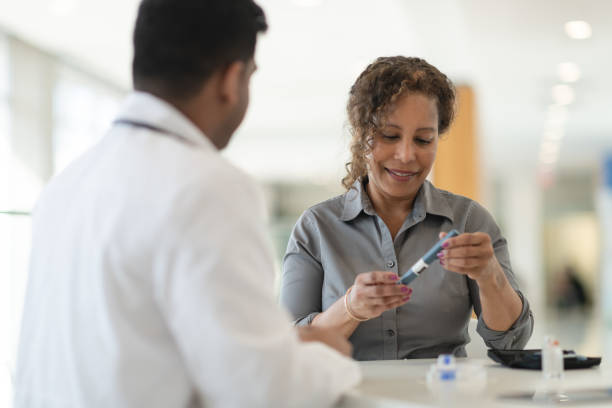 istock Diabetic patient meets with her doctor 1146576908