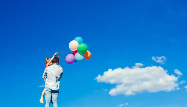 istock Father and daughter walk outdoors family time 1146577586