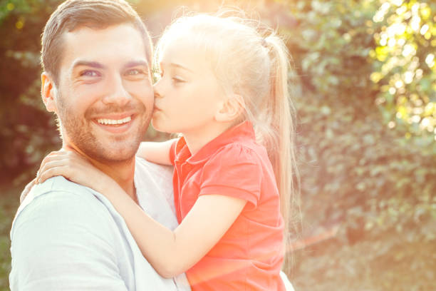 istock Father and daughter walk outdoors family time 1146577592