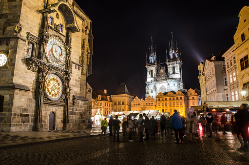 Astronomical Clock at night with Church of Our Lady before Týn in background