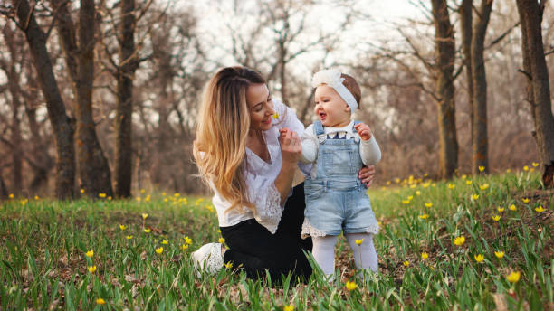 istock Happy family walks in the spring meadow 1146588567