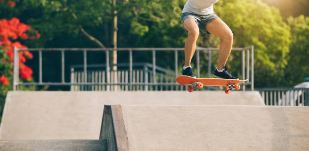 istock skateboarder skateboarding on skatepark ramp 1146588669