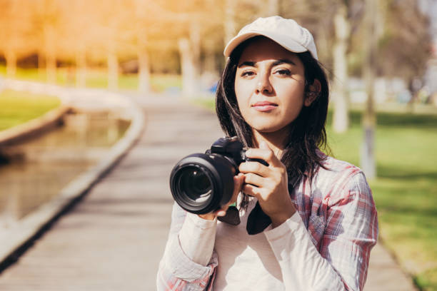 Serious young photographer at work