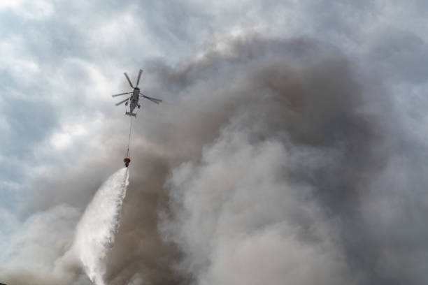 istock Rescue helicopter drops water extinguishes the fire 1146600611