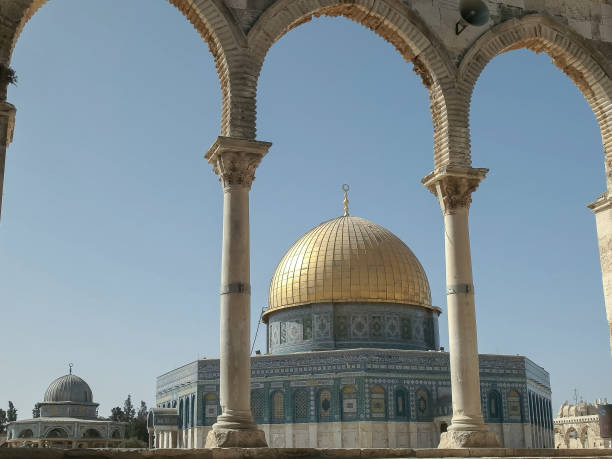 istock dome of the rock mosque framed by arches in jerusalem 1146604007